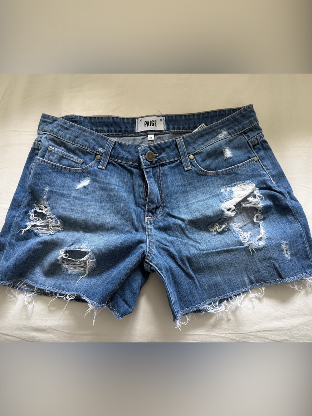 PAIGE Medium Blue Distressed Denim Cutoff Shorts